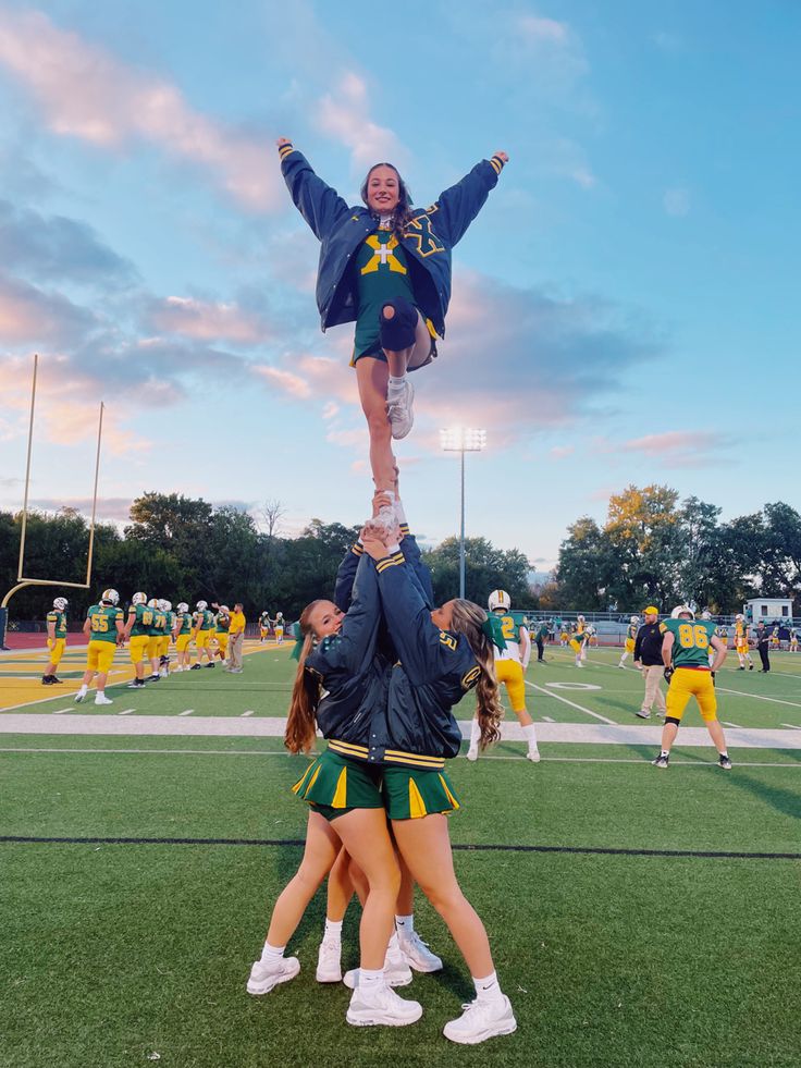 High school cheerleaders doing a liberty stunt